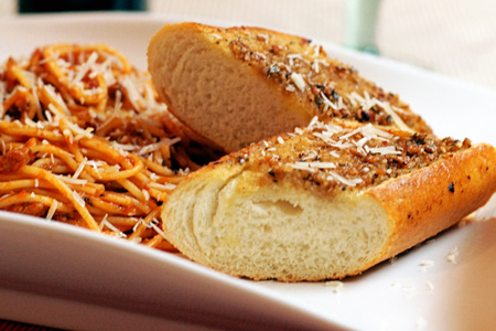 Cheesy Pesto Garlic Bread (via patiodaddiobbq.com)